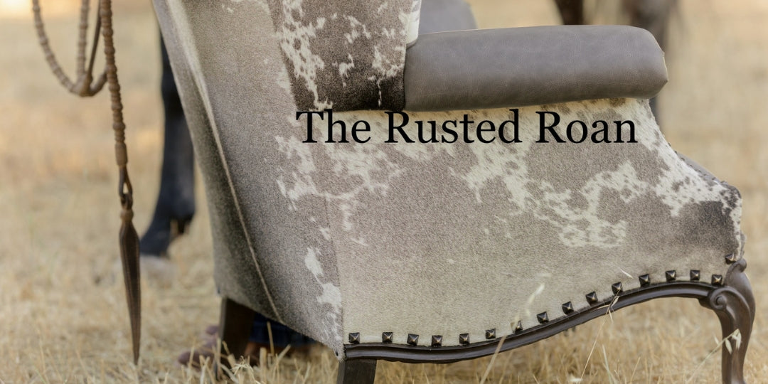 A rusted roan wingback chair completed for sale outside on side view with roany horse in background
